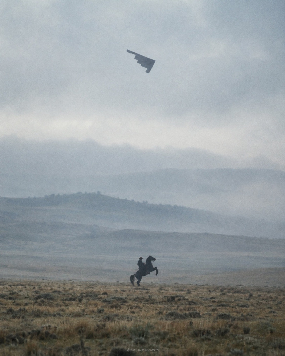 B-2 Spirit bomber flying over cowboy on rearing horse